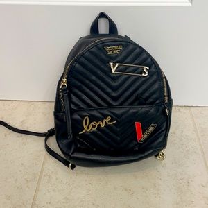 Black VS backpack purse